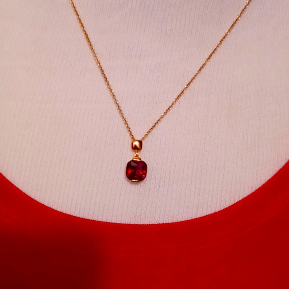 Simulated Ruby Pendant On Delicate 18" Goldtone C… - image 1